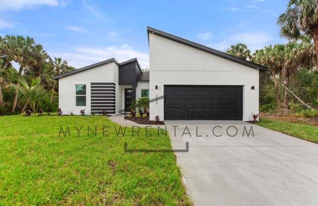 Photo of ONE MONTH FREE RENT! Modern, energy efficient home with ALL of the upgrades! North Port, FL