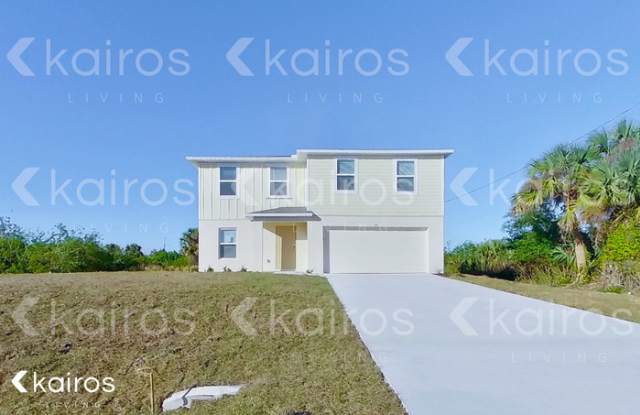 721 Cane Street East - 721 Cane Street East, Lehigh Acres, FL 33974