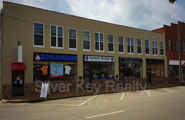 213 East Washington Ave -104