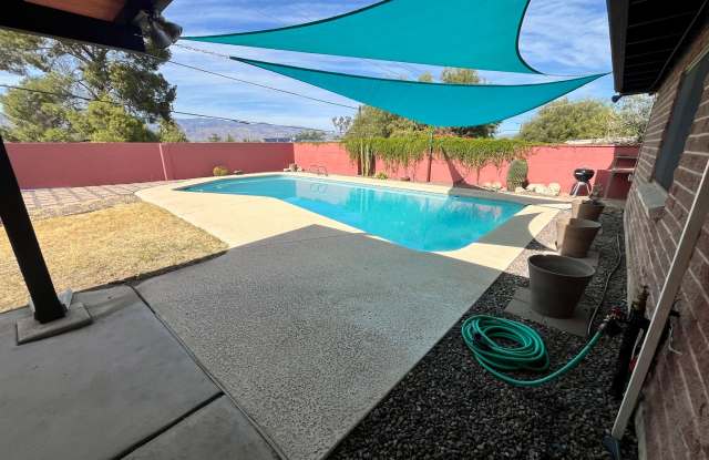 East- 3 bedroom/ 2 bathroom home with sparkling pool!