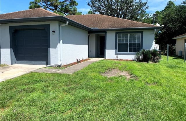 611 Hawthorne Avenue S - 611 Hawthorne Ave S, Lehigh Acres, FL 33974