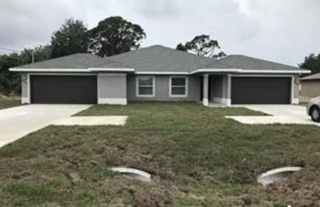 1131 Gordon Avenue S - 1131 Gordon Ave S, Lehigh Acres, FL 33973