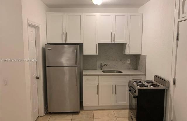712 SW 56 AV