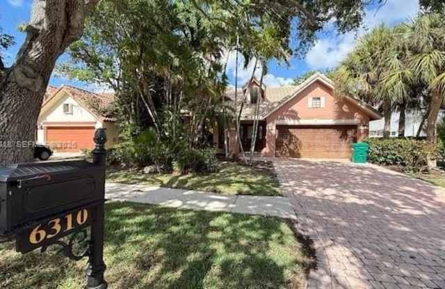 6310 NW 58th Way