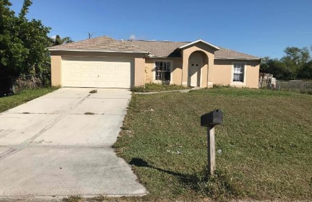 513 Jefferson DR - 513 Jefferson Drive, Lehigh Acres, FL 33936