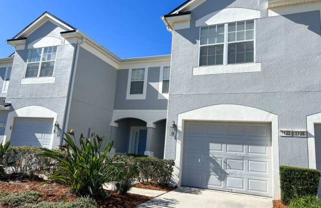 ALL NEW FLOORING(NO CARPET)! FRESH PAINT! NEW STOVE! NEW DISHWASHER! NEW DRYER!! MAN GATED SPRING ISLE COMMUNITY! 1 CAR GARAGE ATTACHED!