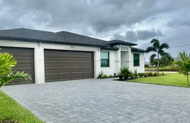 Brand New Construction Home in NE Cape Coral with a Pool on a Corner Lot