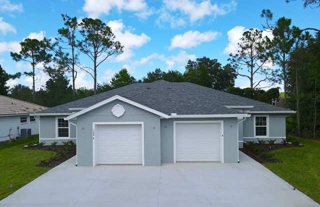 Photo of Roomy 3 Bed 2 Bath Duplex Home for Rent w Screened Lanai in Palm Coast!