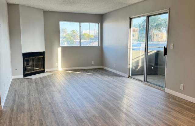 2-Bedroom Residence with Front-Row Views on Lively 2nd Street