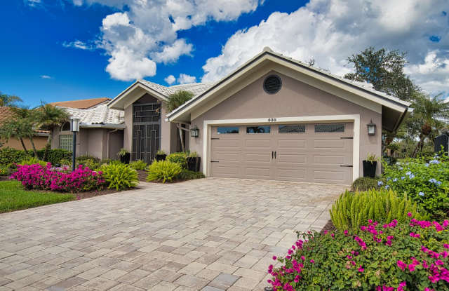 Luxury Home with Saltwater Heated Pool, Spa  Spectacular Golf Course Views, and includes Social Membership to the Plantation Golf and Country Club.