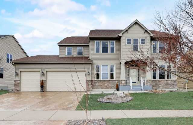 Photo of Grand 5 bed 4.5 bath Maple Grove Home w/ 3-Car Garage! Fully Furnished