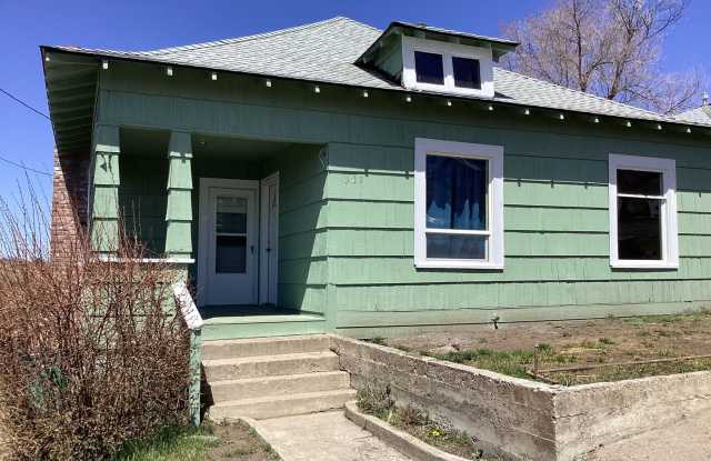 Vintage 1910 Home with Hardwood Floors and Fenced Yard