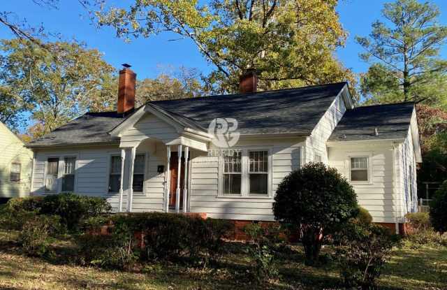 Spacious 3 bedroom and 1 bath home with FENCED IN BACKYARD located minutes from downtown Spartanburg!