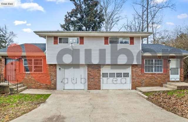 Pet-Friendly Duplex in East Ridge with Fenced Yard & Bonus Room! $350 Off First Month!