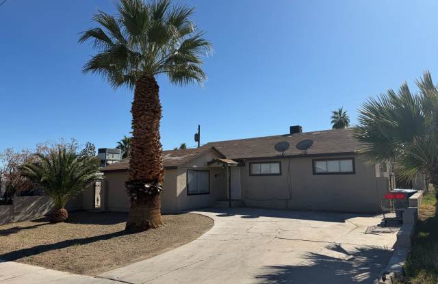 SINGLE STORY FEATURING 4 BEDROOMS  2 BATHS