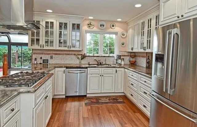 Great 4 Bedroom Home with Large Backyard Steps From De La Salle High!