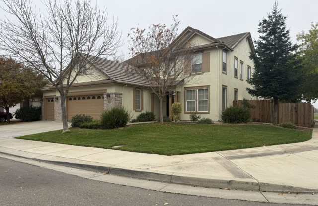 Lovely 5/3 with a desirable downstairs bedroom.