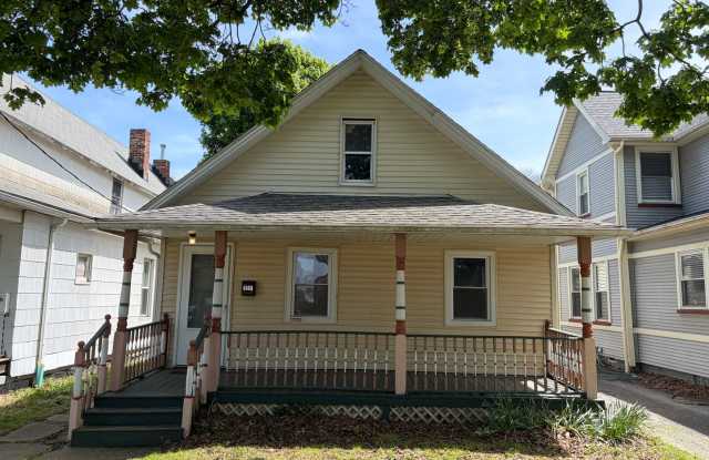 Charming West Side Home with Covered Porch & First-Floor Laundry