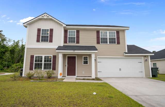Live Close to Fort Stewart in This Spacious 4-Bedroom Home with a Large Backyard