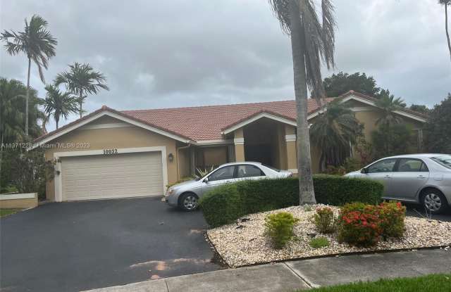 10032 NW 13th Ct