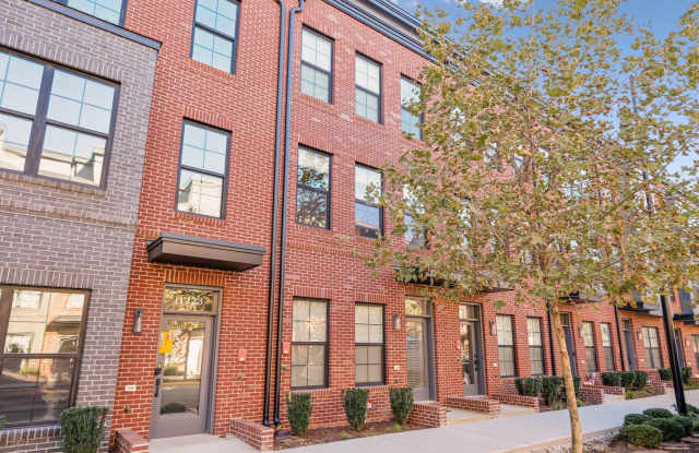 Photo of Welcome to this stunning 3-bedroom, 3.5-bathroom townhouse available for rent in the heart of Reston Station.