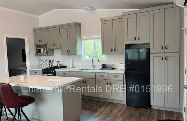 Photo of Granny unit- newly built, spacious, one bedroom, upstairs, PG/Wtr/Sewer included!