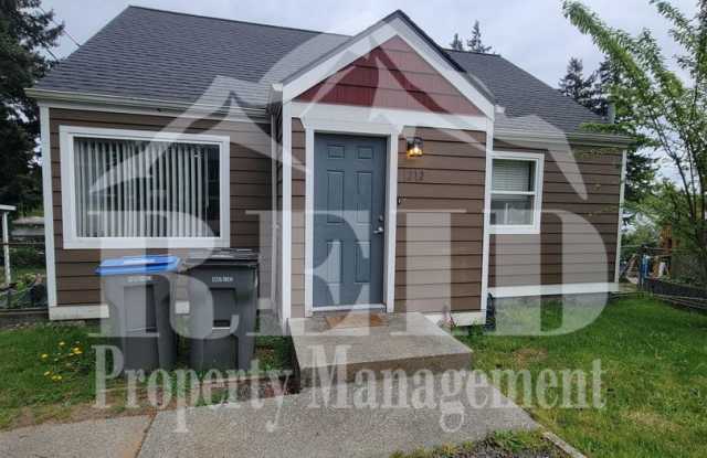 Centrally Located Bremerton Home With Partial View of Sinclair Inlet from Deck