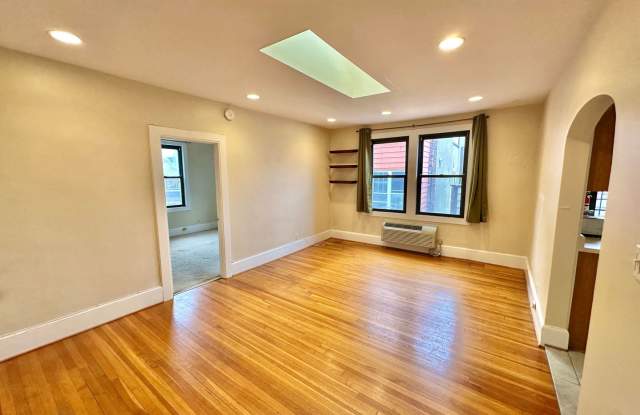 Dashing Dupont Circle 1 Bedroom Apt with skylight and building roof deck.