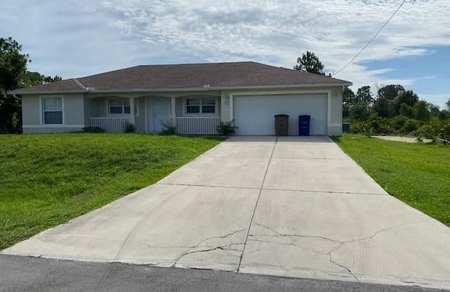 755 Courtland Ave S . - 755 Courtland Avenue, Lehigh Acres, FL 33974