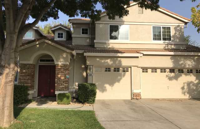 Beautiful 4 Bedroom, 2.5 Bath Master BR downstairs Tracy Home