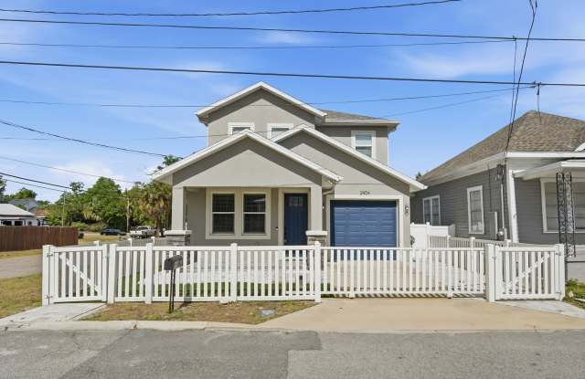 2021 Ybor City 4BR/3BA two story home with attached one car garage.
