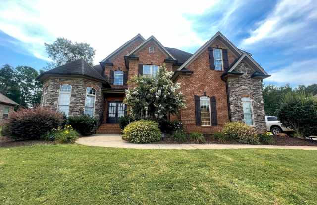 Photo of Beautiful 4-Bedroom Home with 2-Car Garage