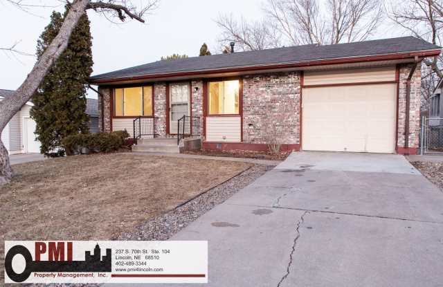 4 bedroom 2.5 baths house with a fenced yard