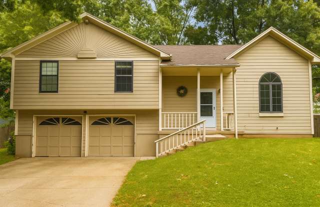 SEE IT NOW: Charming 4-Bedroom Home with Finished Basement  Vaulted Ceilings!