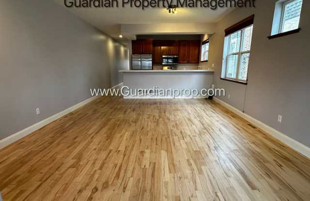 Photo of Spacious Uptown Side By Side, Dishwasher, Garage, In Unit Laundry, Private Rooftop Deck