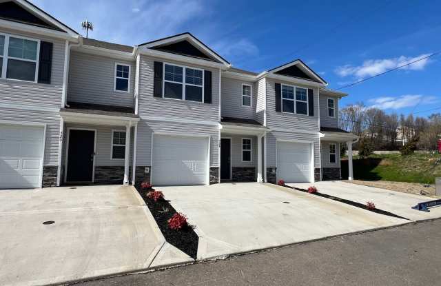 Photo of Beautiful New Construction 3 bedroom 2.5 Condo with garage- Water, trash  sewer incuded!