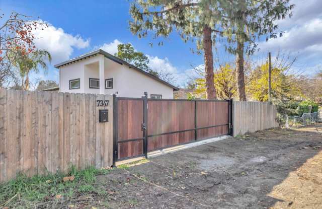 NEWER 2 BED, 1 BATH HOME WITH HUGE YARD AND ENCLOSED DRIVEWAY