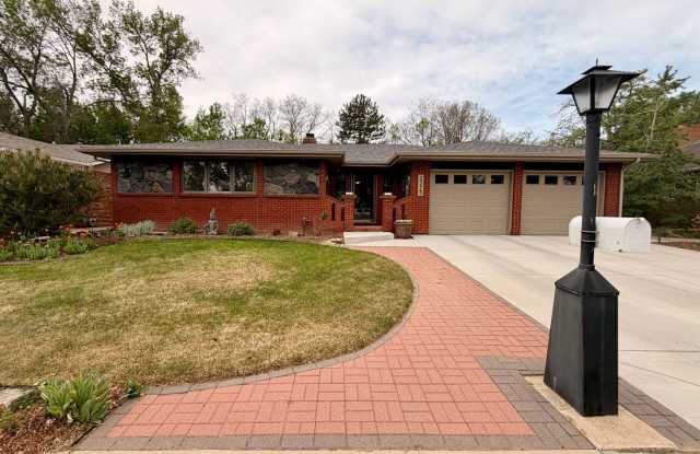 Rockmont Heights Home with Sunroom, Multiple Fireplaces & Private Yard