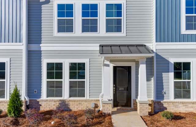 ENJOY LIVING DOWNTOWN ON THE BROAD RIVER