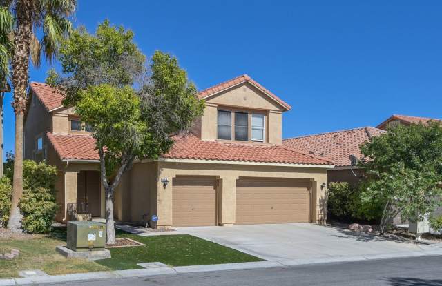 Summerlin!! 5 bedroom home!! W/Bed  bath downstairs!! 3 Car Garage!! Synthetic grass in front yard. Back has patio.