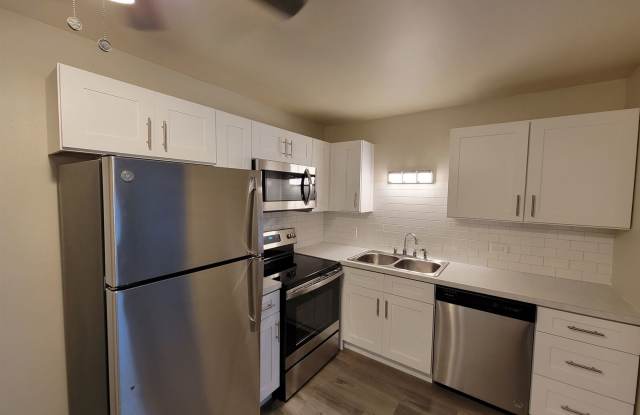 Updated Apartment With NEW KITCHEN & BATH With Balcony/Patio/Private Parking!