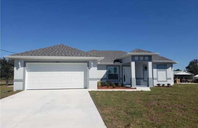 1257 Columbus BLVD - 1257 Columbus Boulevard, Lehigh Acres, FL 33913