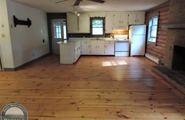 Cute Log Home Overlooking Wooded Area