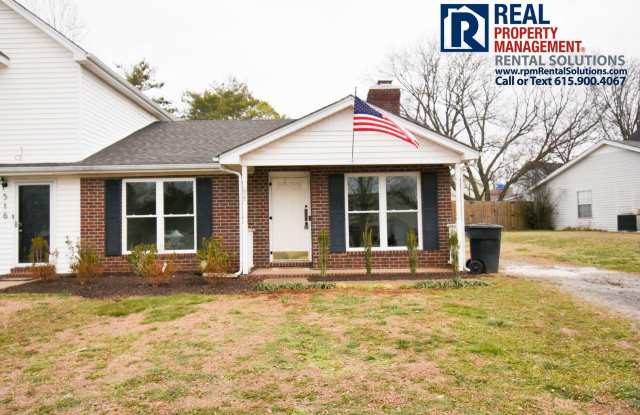 Adorable, updated 2BD 2BA duplex! Washer/dryer included and large fenced-in back yard!