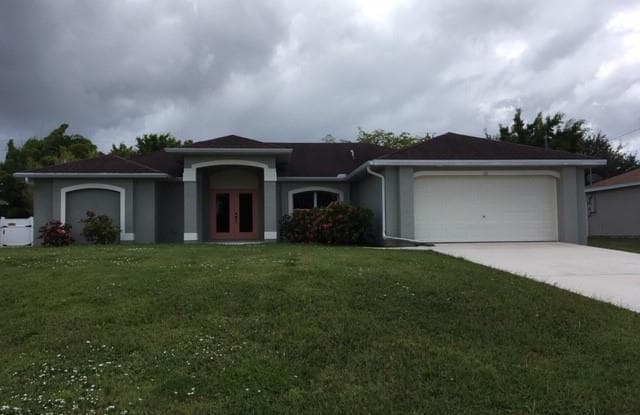 126 SW 21st LN - 126 Southwest 21st Lane, Cape Coral, FL 33991