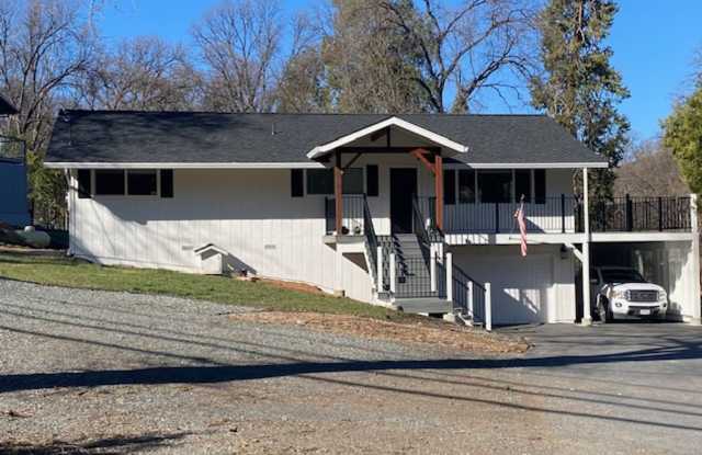 Charming 3 Bedroom Sonora Retreat: Modern Amenities, Solar Savings, and Spacious Outdoor Living Await!" - 21120 Phoenix Lake Road, Phoenix Lake, CA 95370