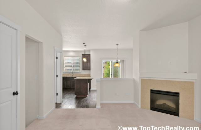 Photo of Charming 3 BD* 2.5 BA* Townhome! Excellent Location- Hardwood Floors, A/C, Open Floor Plan!