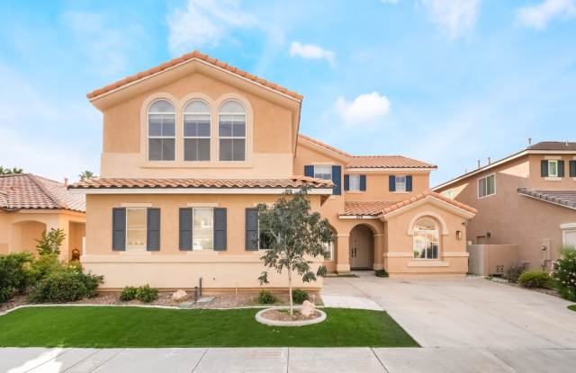 Beautiful Gated Home with Open Floor Plan and Low-Maintenance Backyard!