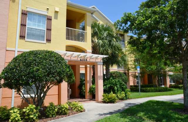 Cute 3/2 Condo in Horizons at Vista Lakes (Gated) with Updated Flooring and Front Parking Space