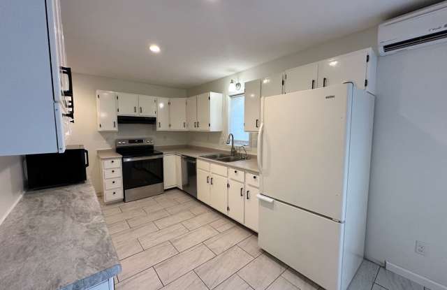 Photo of 4-Bedroom Home with Fully Fenced In Large Backyard!